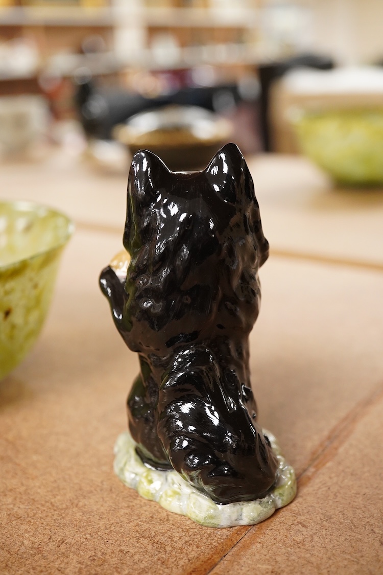 A Beatrix Potter, stamped F Warne and Co Ltd, Beswick figure of “Duchess” with pie, 10cm high.